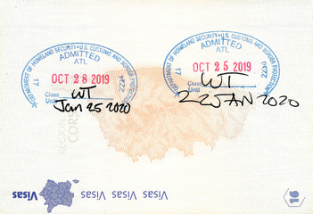 Immigration stamps of the United States in a French passport. No personal data