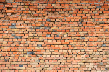 Old brick wall closeup. Red brick