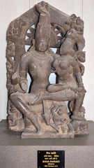 Fototapeta na wymiar Gwalior, Madhya Pradesh/India - March 15, 2020 : Sculpture of Shiva-Parvati built in 12th Century A.D.