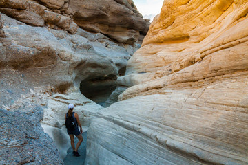 Female Hiker In The Narrows Of Mosaic Canyon, Death Valley National Park, California, USA