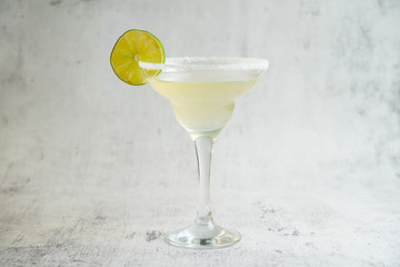 Daiquiri cocktail garnished with a lime wedge