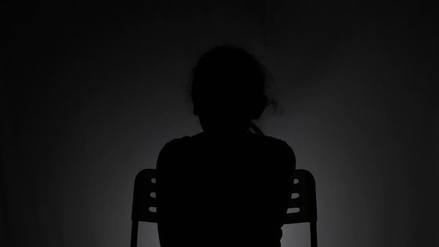 Anoymous girl speaks on various subjects in the dark