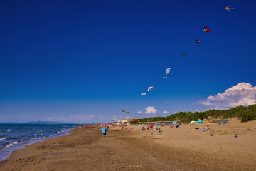 Donoratico beach with kite seller Tuscany Italy