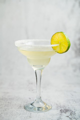 Daiquiri cocktail garnished with a lime wedge