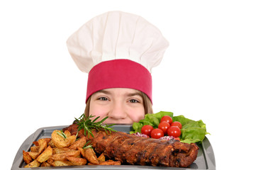 girl cook with pork spare ribs at plate