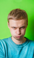 Obraz premium young man inflate his cheeks