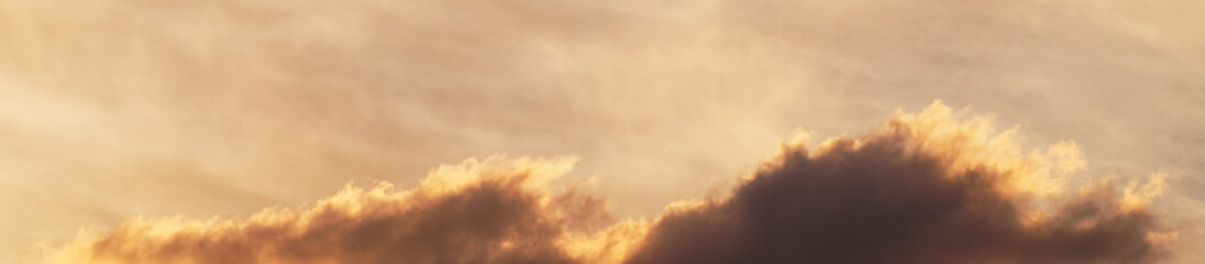 Background for a banner with a beautiful sunset sky. Beautiful clouds.