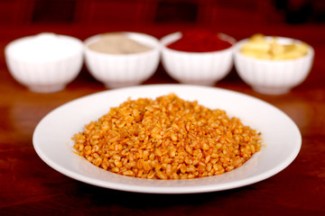 Cooked oatmeal with delicious tomato sauce ready to serve