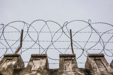 Concertina wire placed on the top of a wall