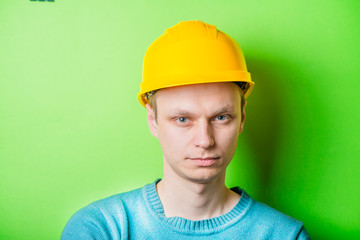 young man in a yellow helmet
