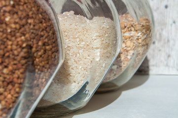 stocks of cereals and pickled tomatoes and cucumbers in jars,sunflower oil and mushrooms