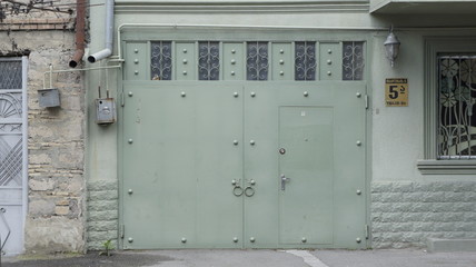 wrought iron gates in front of the house