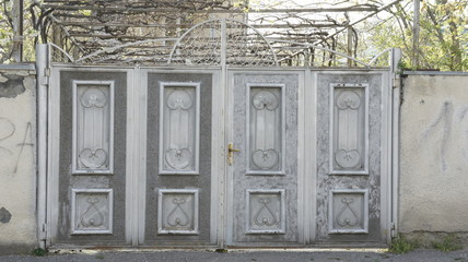 wrought iron gates in front of the house