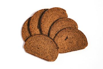 Sliced slices of bread isolated on white. Wholemeal bread. Top view of sliced bread.