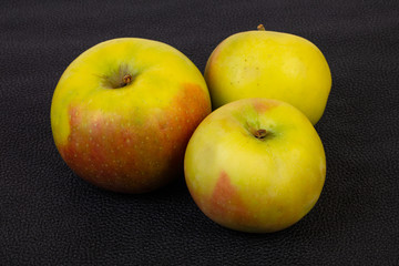 Ripe apples over background