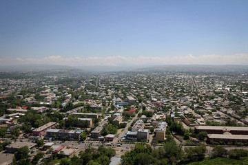 Osh town panoramic view by summer noon, Kyrgyzia