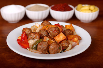 very nice meatballs barbecue with fragrant Turkish spices on white plate