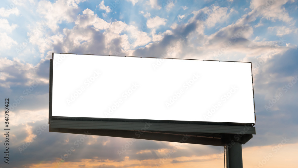 Wall mural mock up image: blank white billboard or large display with sun beams shining through clouds at sunse
