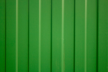 Green zinc metal corrugated fence background,metal wall or roof