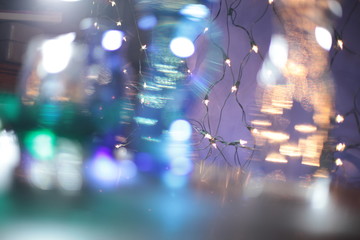 Naklejka premium blurred lights and glass bokeh.