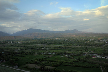 Scenic misty summer landscape near Karakol town, Kyrgyzia