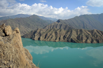 Toktogul reservoir with blue water view by spring, Kyrgyzia