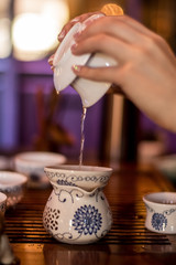 hand holding a cup of tea