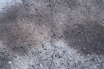 Fototapeta premium Crack concrete footpath. Close up crack cement road