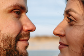 Faces of lovers looking into each other's eyes