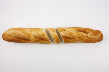 Freshly baked cut bread on a white background. For the presentation of food products, bread production and basic necessities.