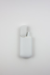 Electronic cigarettes in a white case. For the presentation of tobacco products and the work of the tobacco industry.