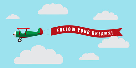 Vintage airplane with banner - Follow Your Dreams © ArtemSam