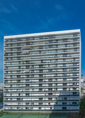Courbevoie, France - 04 16 2020: View of the Defense towers district and gardens at sunset