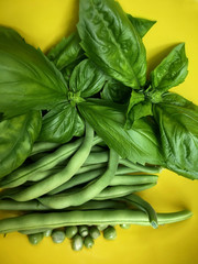 Vertical view of basil and peas