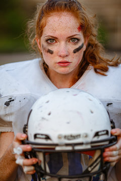 American Football Player Girl On The Field At Sunset