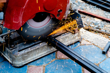 Steel cutter is working to cut sparkling steel