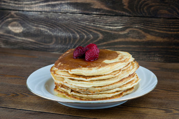 pancakes with honey and raspberries
