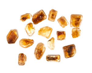 wheat grains in burlap with a wooden spoon on a white background