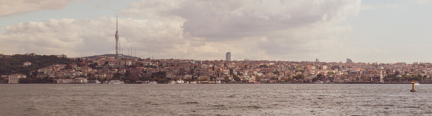 Panoramic view of Istanbul skyline from Bosphorus strait in sepia color