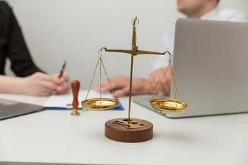 Legal meeting in office. Man and woman talking