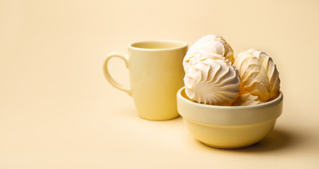 
sweet marshmallows with coffee, cup