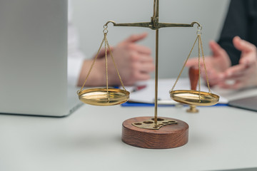 Legal meeting in office. Man and woman talking