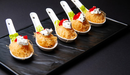 crispy scallops with soy sauce and deep-fried rice noodles