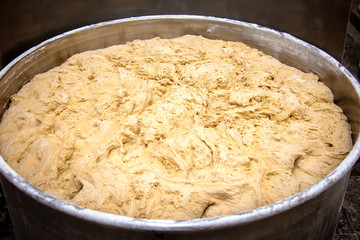 Cooking bread dough in a dough mixing machine