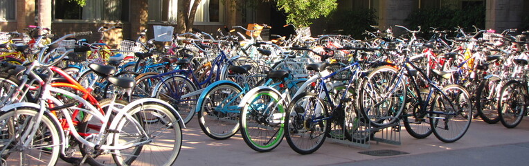 Fototapeta na wymiar Rows of parked bicycles at the University town of Santa Barbara