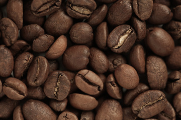 coffee beans are scattered on the table
