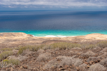 ocean and mountains in the desert of the Canary Island of Fuerteventura