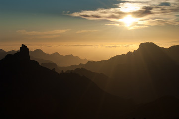 Roque Bentaiga to the left and Altavista mountain to the right at sunset. Gran Canaria. Canary Islands. Spain.