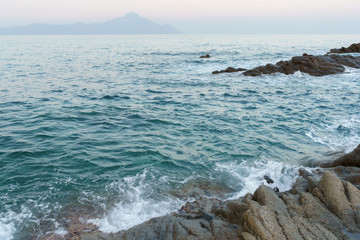 Seaside view waves on the Athos mountain