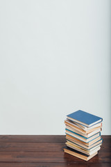 a lot of stacks of educational books in the library on a white background